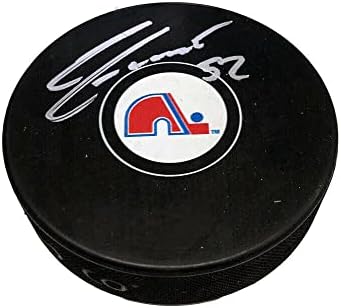 Шайбата Квебек Нордикес с автограф на Адам Метра - за миене на НХЛ с автограф